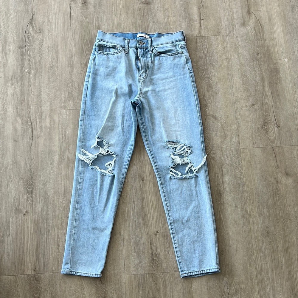 Size 7/28w High Rise Mom Jeans light washed, 2 rips at the knees.